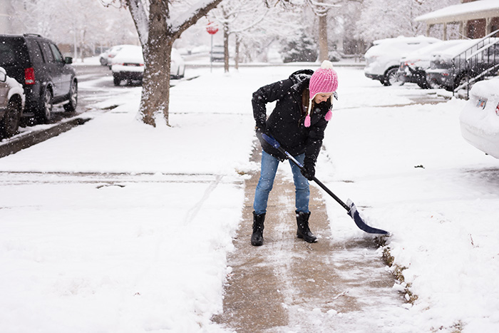 Keep Your Sidewalks and Driveways Clear: A Key Step in Avoiding Insurance Claims