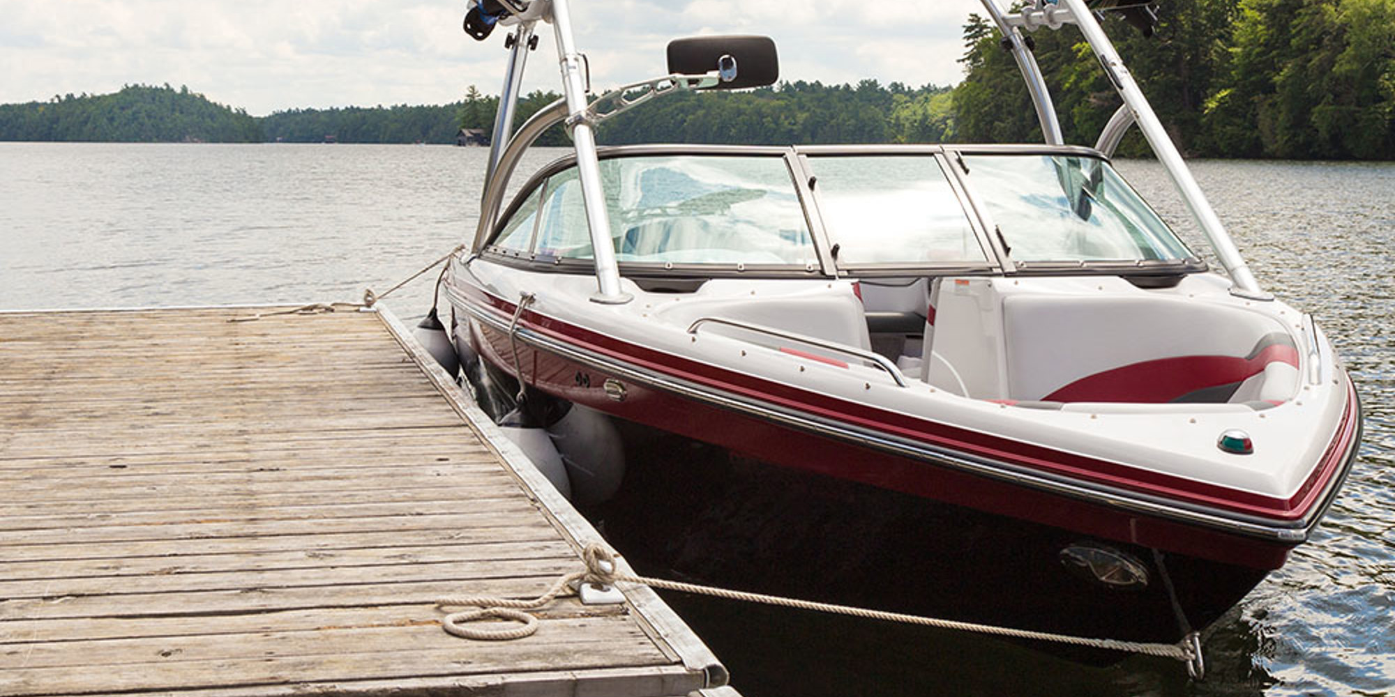A boat next to the dock.
