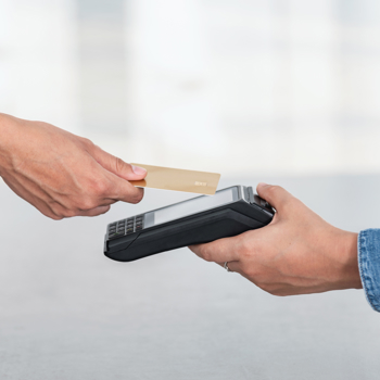 A credit card switching hands