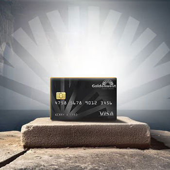 A credit card sitting like an ancient idol on top of a stone block
