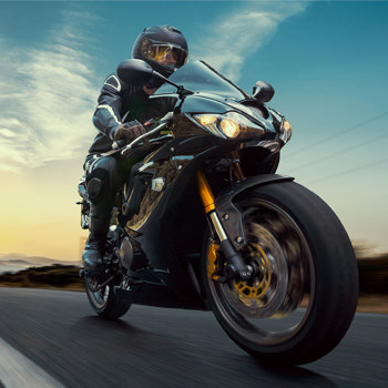 A close up of someone riding a motorcycle