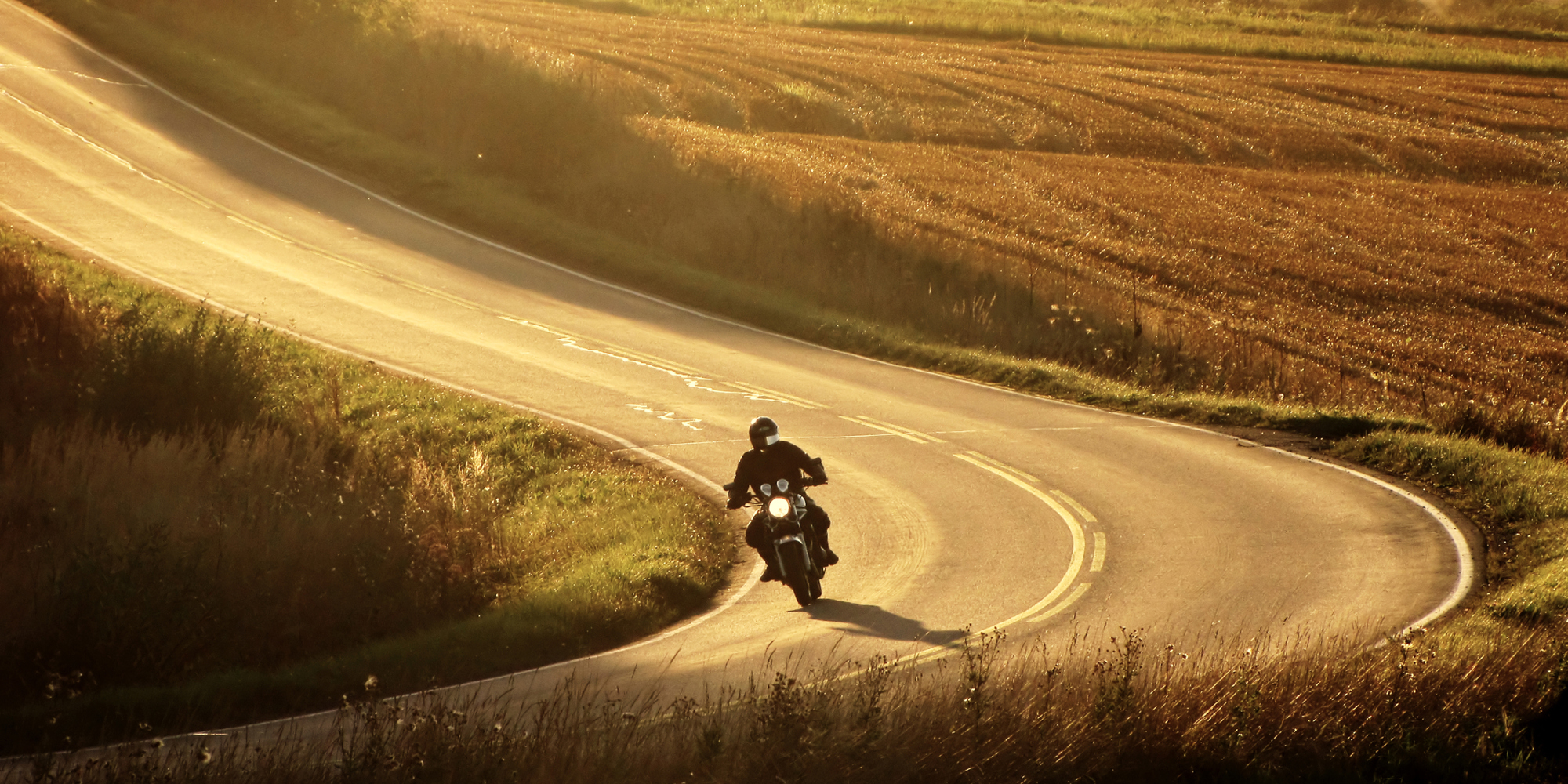 A motorcycle driving through the canyon