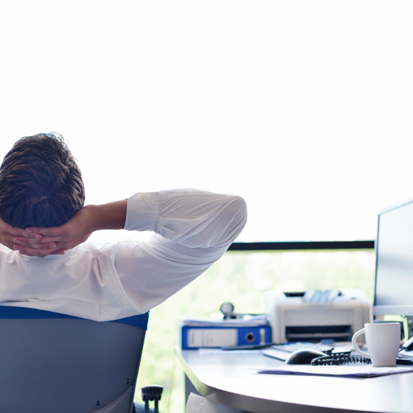 Businessman leaning back on his chair